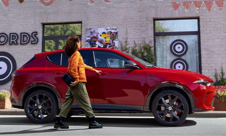 Woman getting in vehicle